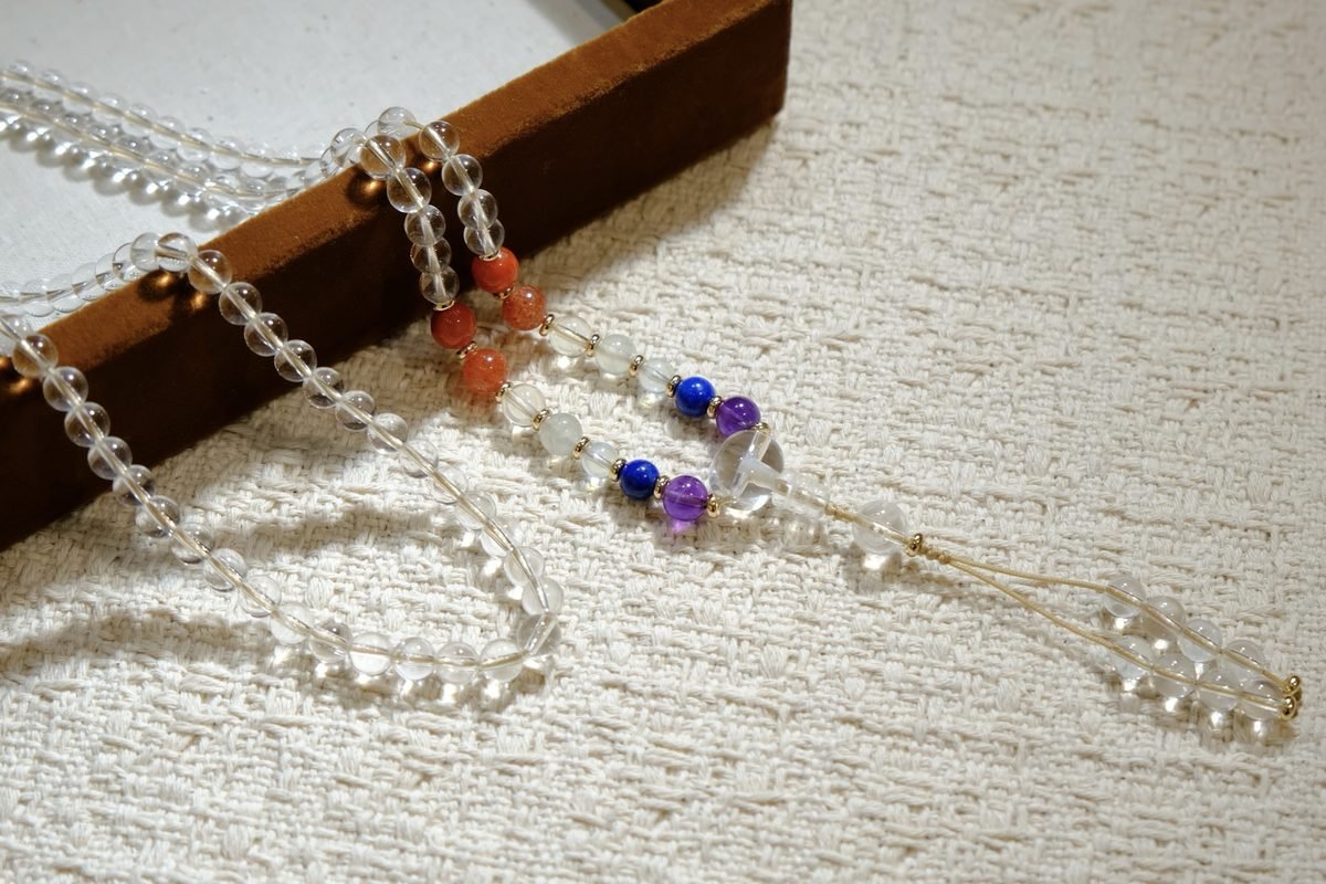 6mm 7 Chakra Balancing Mala with Amethyst & Clear Quartz · 108-Bead Mala